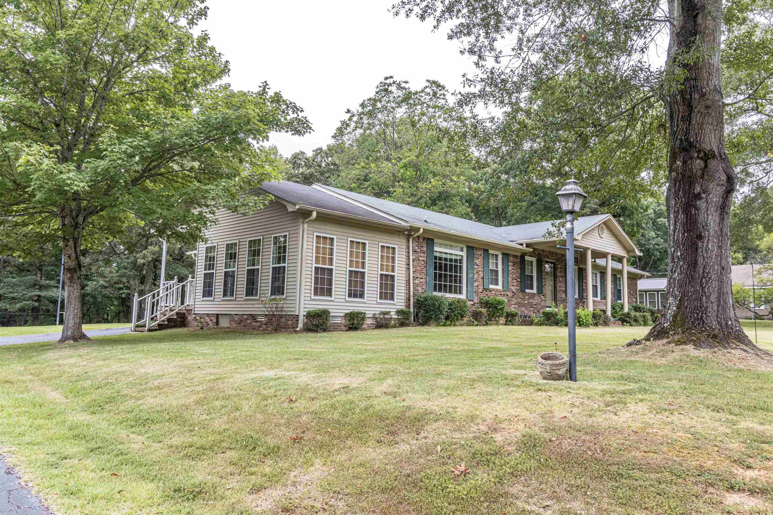 239 Old Road South, Unit 5 Selmer, TN 38375 - Photo 3 of 34 a view of a house with a yard