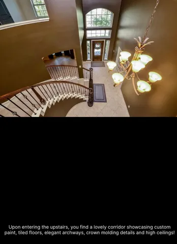 a kitchen with a black refrigerator