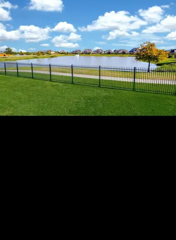 a view of building with yard