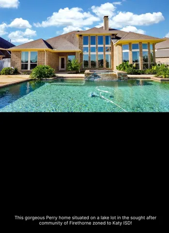 a living room with stainless steel appliances kitchen island granite countertop a black stove top oven