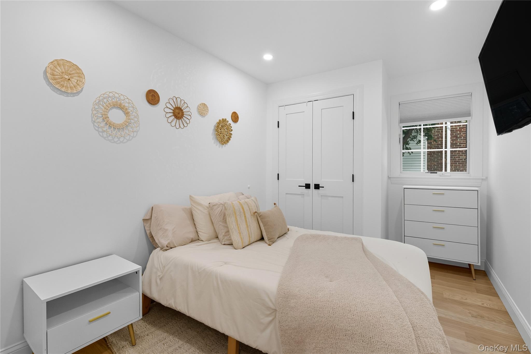 17 Entrance Road East Hills, NY 11577 - Photo 19 of 30 a bedroom with a bed and a window