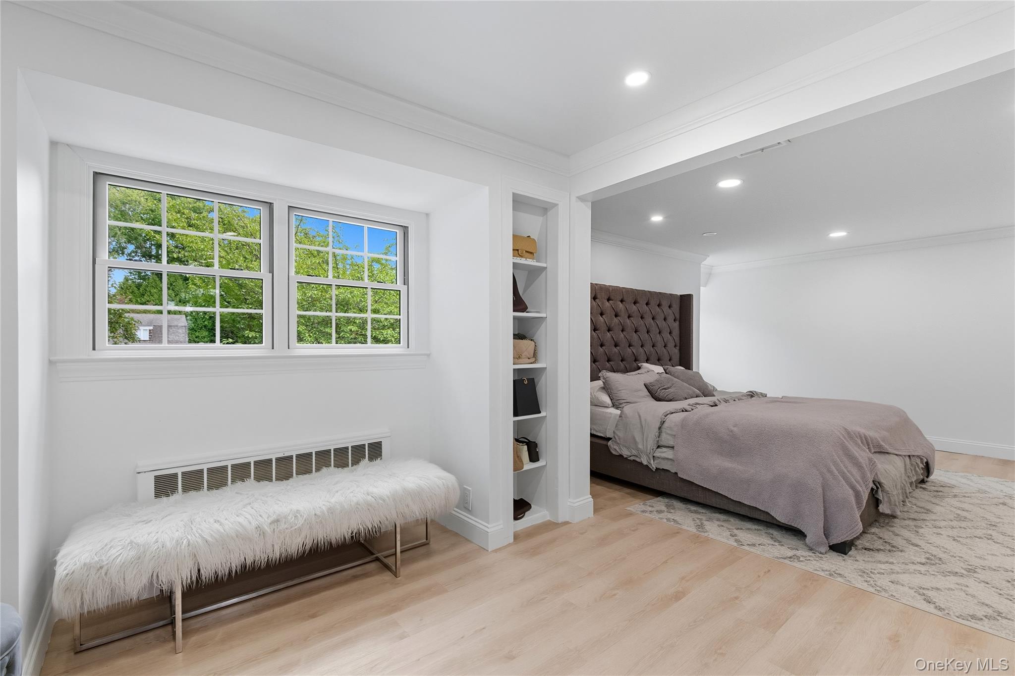 17 Entrance Road East Hills, NY 11577 - Photo 23 of 30 a bedroom with a bed and a window