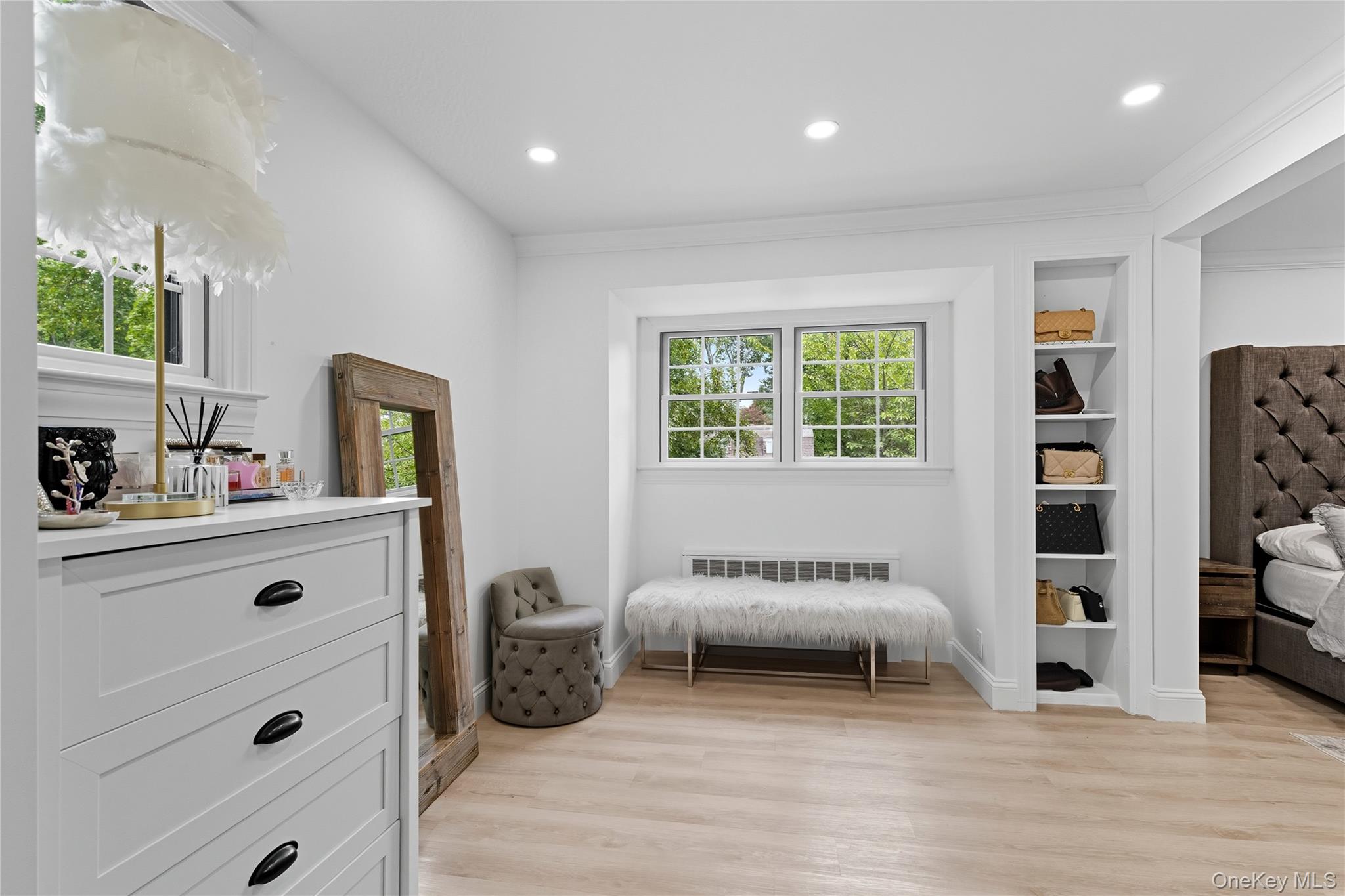 17 Entrance Road East Hills, NY 11577 - Photo 24 of 30 a bedroom with furniture and a wooden floor