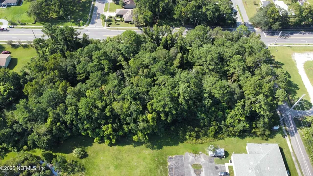 a view of yard with swimming pool