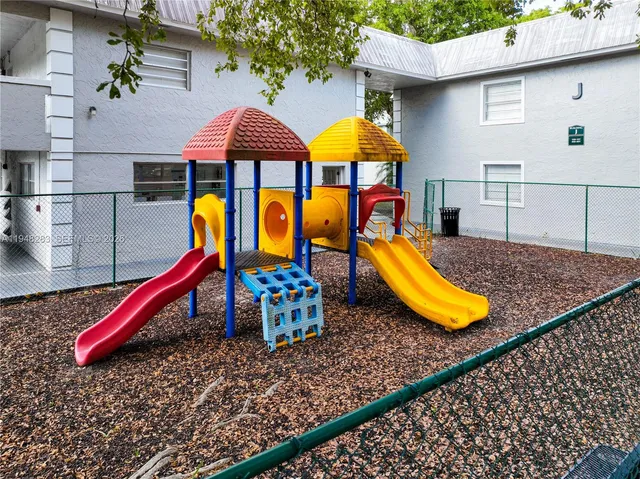 a view of a swimming pool with a lounge chairs