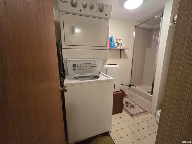 a bathroom with a toilet and a sink