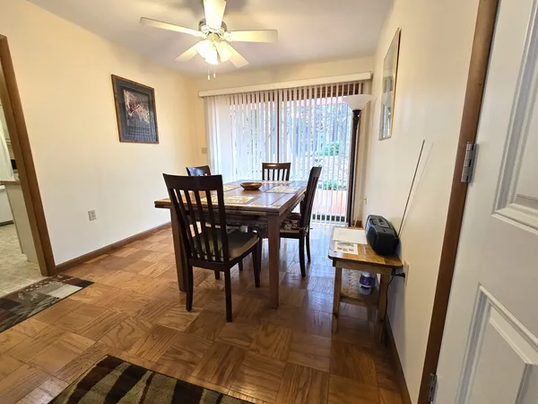 a kitchen with a refrigerator and a sink