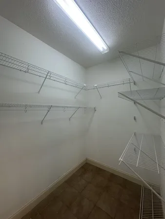 a view of a room with racks on the wall