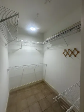 a view of a room with racks on the wall