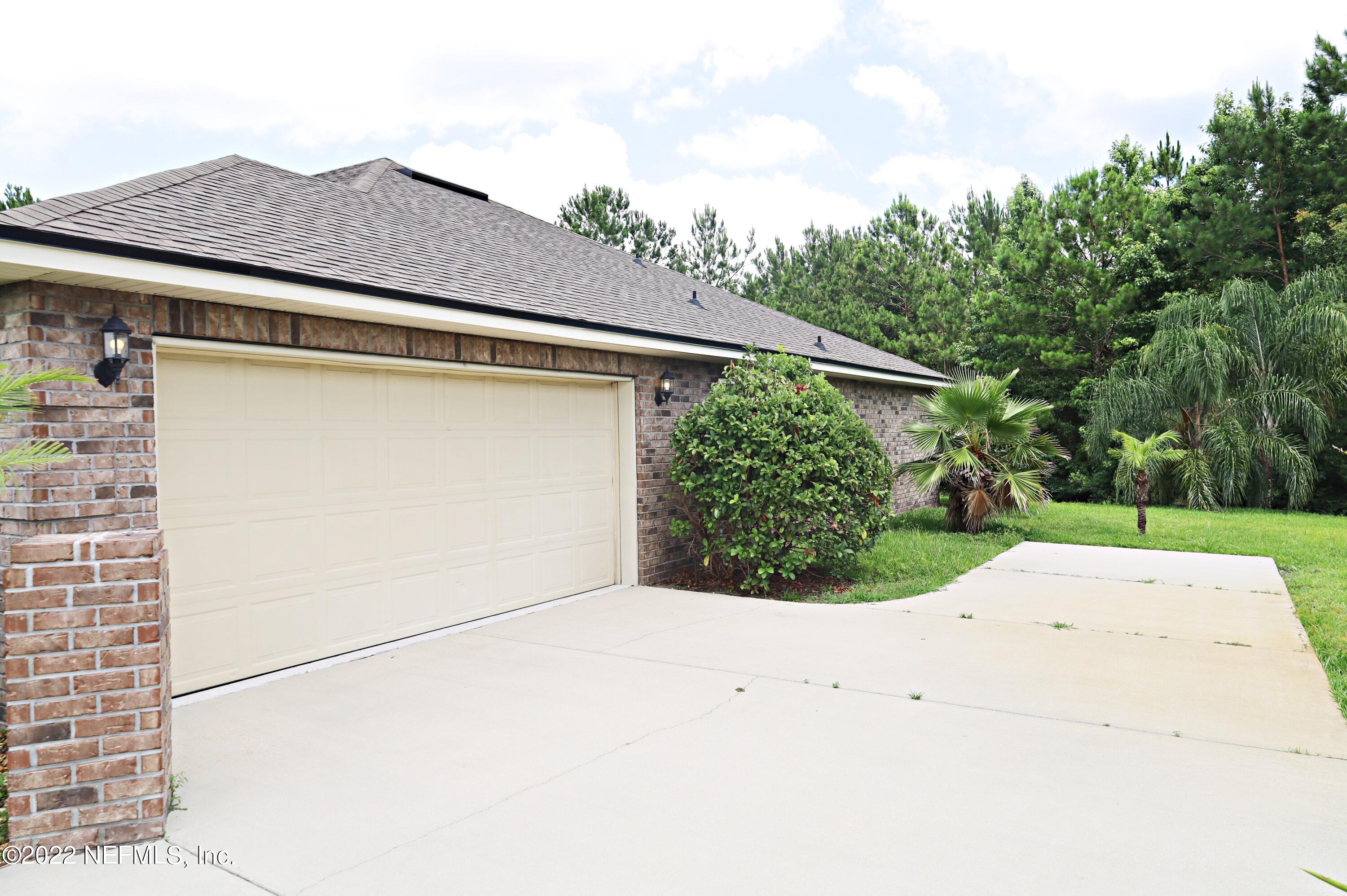 10991 Lothmore Road Jacksonville, FL 32221 - Photo 4 of 23 Side Entry Garage