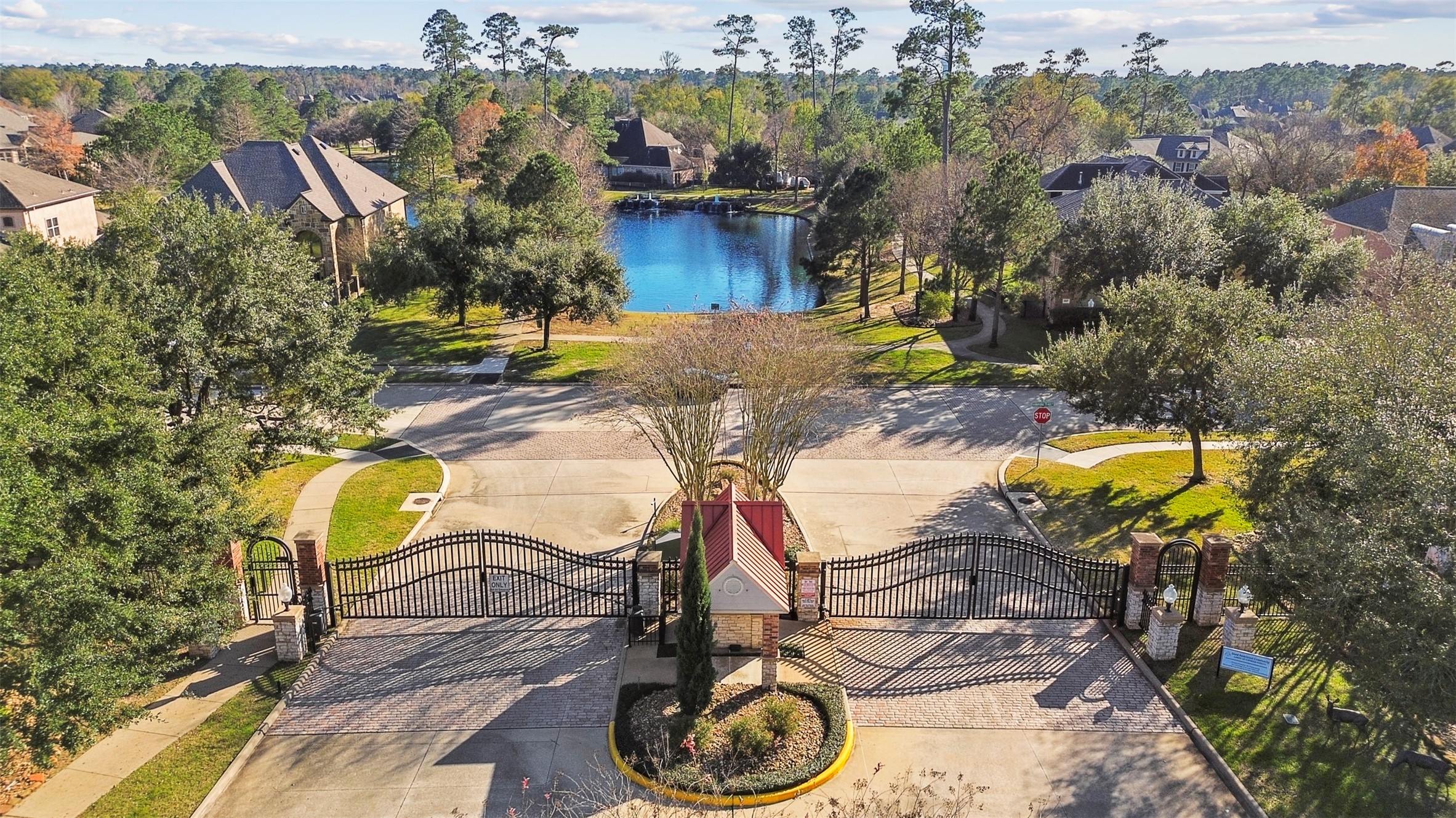 2603 Hendricks Lakes Drive Spring, TX 77388 - Photo 2 of 50 Exclusive gated community featuring private lake views, mature trees, and controlled access—combining security with scenic surroundings within Klein!
