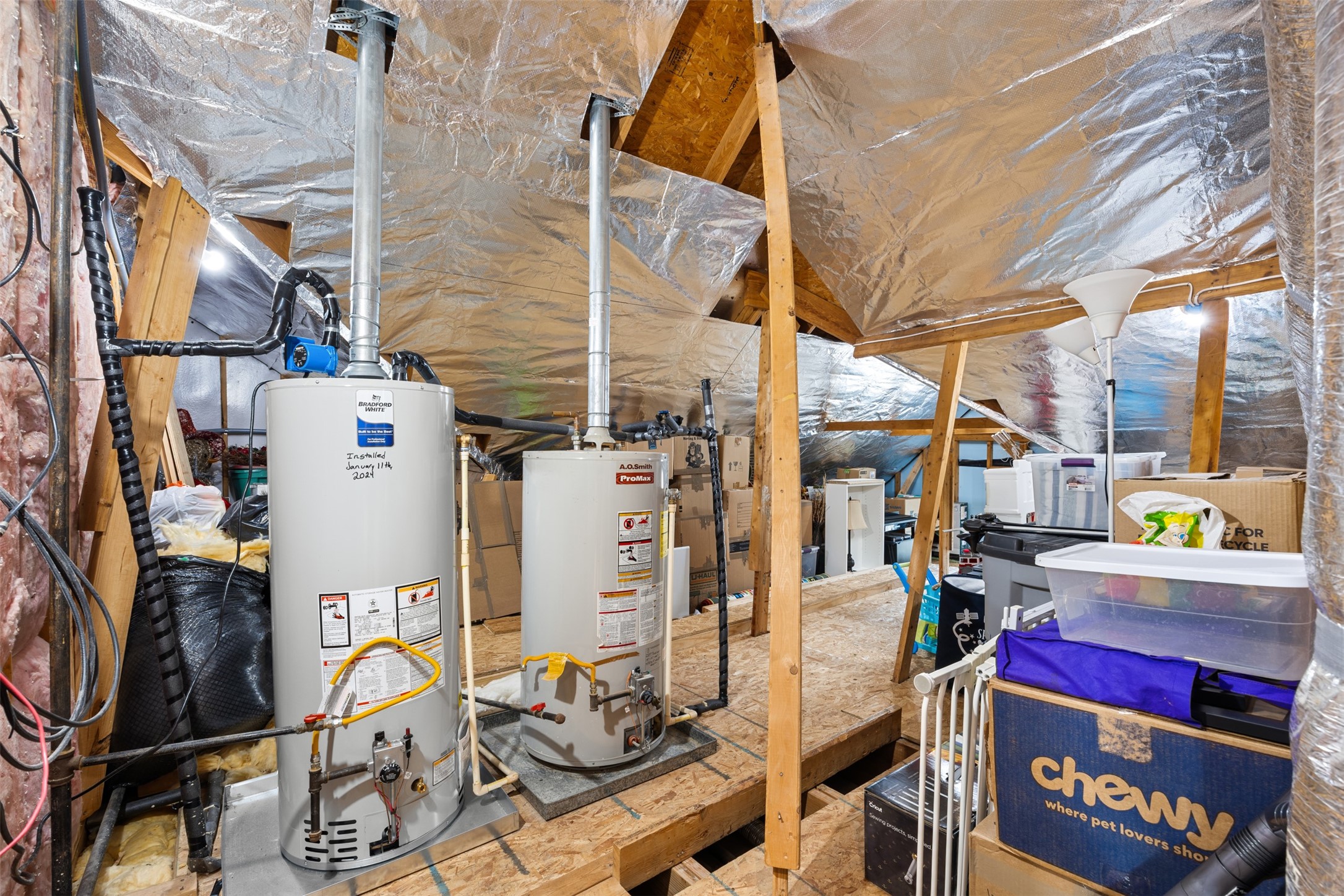 2603 Hendricks Lakes Drive Spring, TX 77388 - Photo 45 of 50 Rare, fully decked walk-in attic offering exceptional storage space with convenient door access. Ample room for seasonal items, organization, and long-term storage—an added benefit not often found in homes of this size.