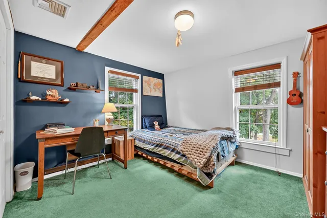 a room with a bed and a window