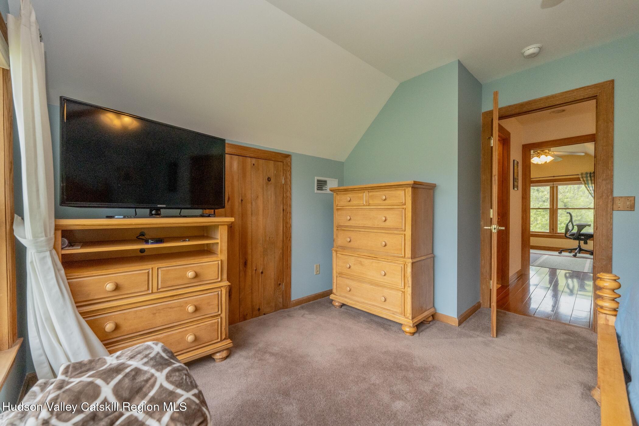 140 Stone Dock Road High Falls, NY 12440 - Photo 25 of 42 a room with furniture and a flat screen tv