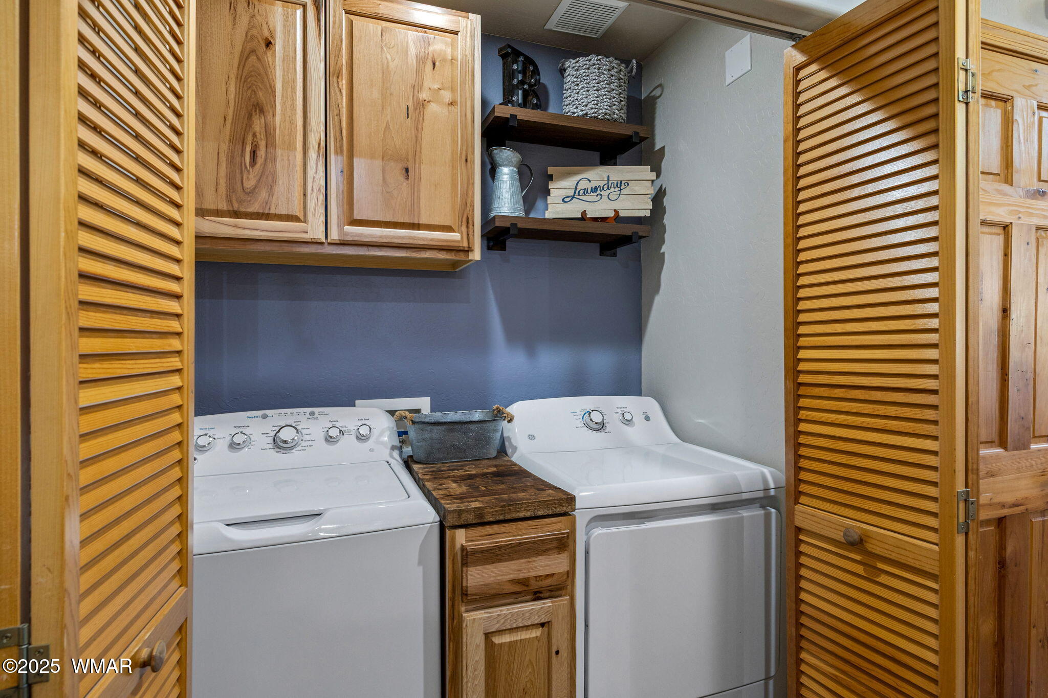 2295 Bison Rnch Trail Overgaard, AZ 85933 - Photo 20 of 68 CUSTOM BUILT LAUNDRY CLOSET