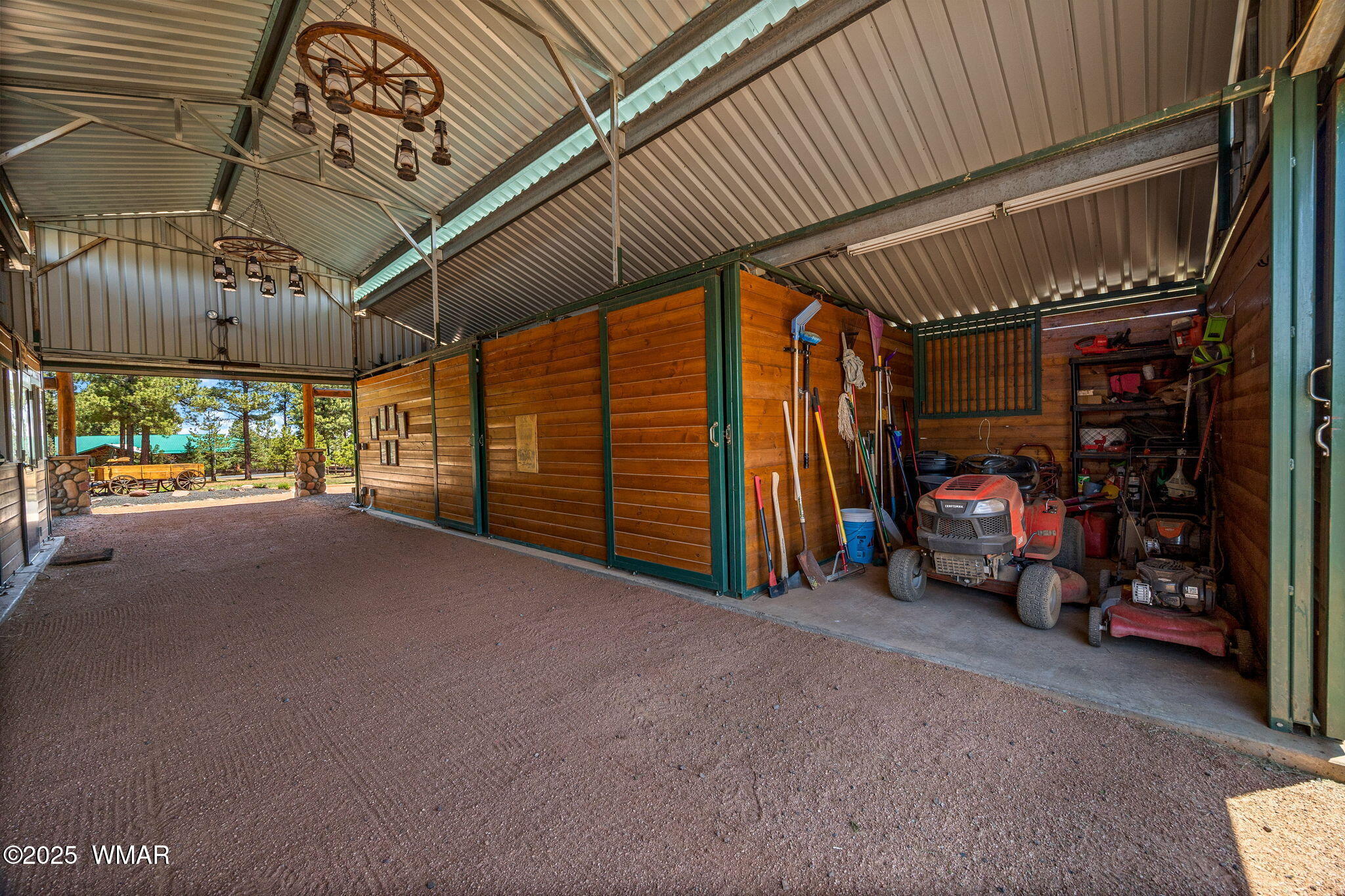 2295 Bison Rnch Trail Overgaard, AZ 85933 - Photo 47 of 68 CURRENT OWNERS USE THIS SPACE FOR LAWN EQUIPMENT WHICH ALL CONVEYS WITH THE HOME!