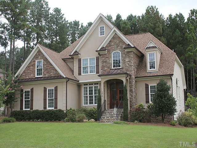 3616 Griffice Mill Road Raleigh, NC 27610 - Photo 1 of 25 a front view of a house with garden