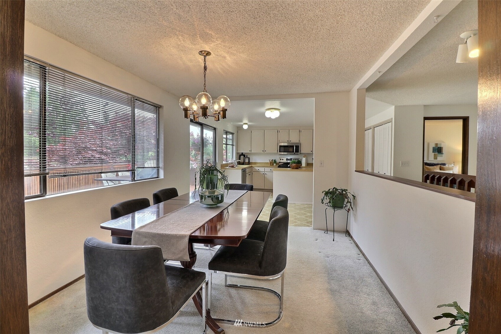 22105 2nd Place West Bothell, WA 98021 - Photo 11 of 37 a view of a dining room with furniture and chandelier