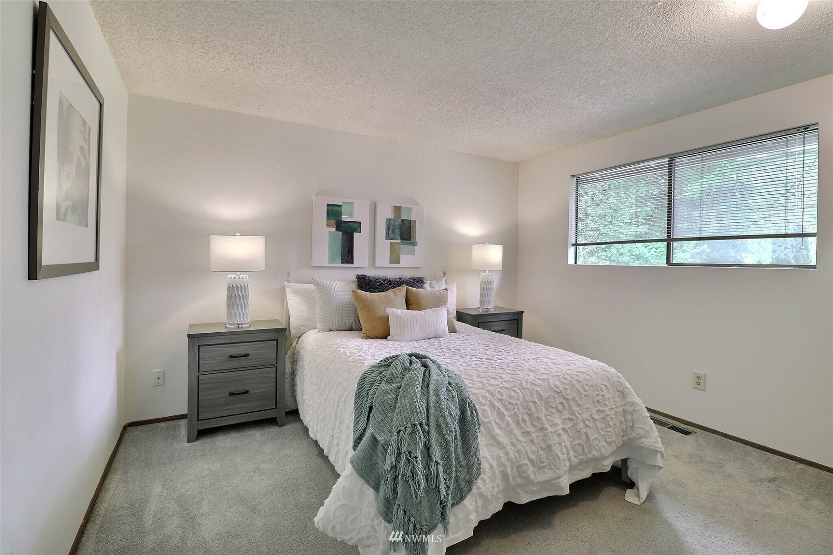 22105 2nd Place West Bothell, WA 98021 - Photo 17 of 37 a bedroom with a bed and a window