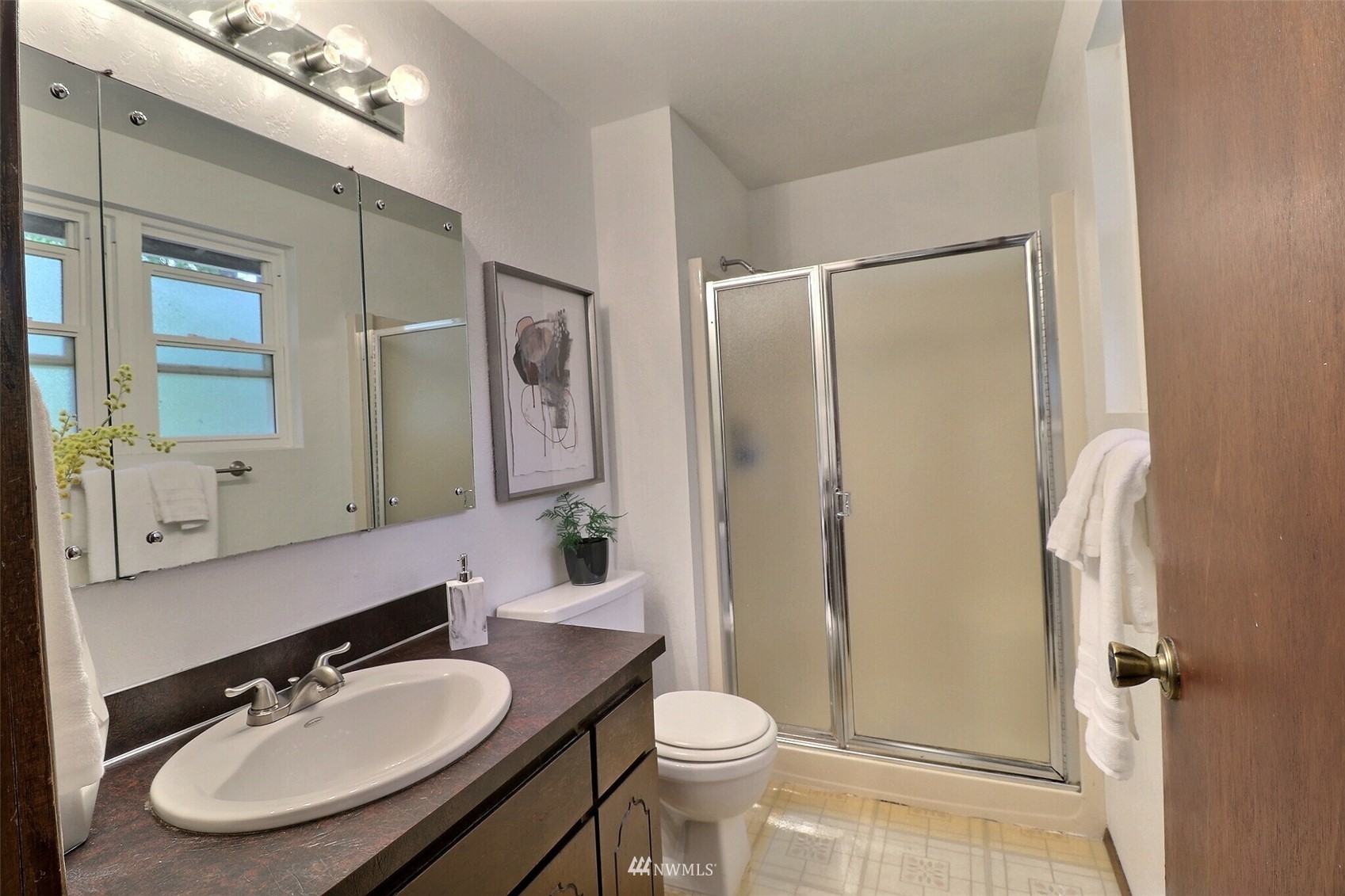 22105 2nd Place West Bothell, WA 98021 - Photo 21 of 37 a bathroom with a sink toilet and shower