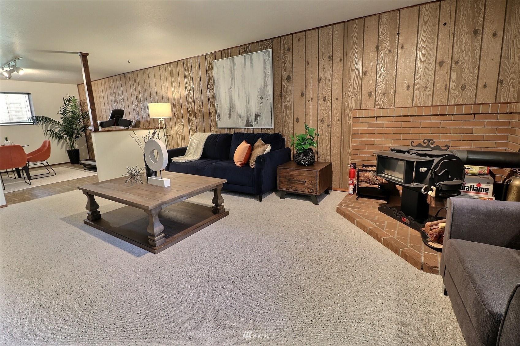 22105 2nd Place West Bothell, WA 98021 - Photo 24 of 37 a living room with furniture and a fireplace