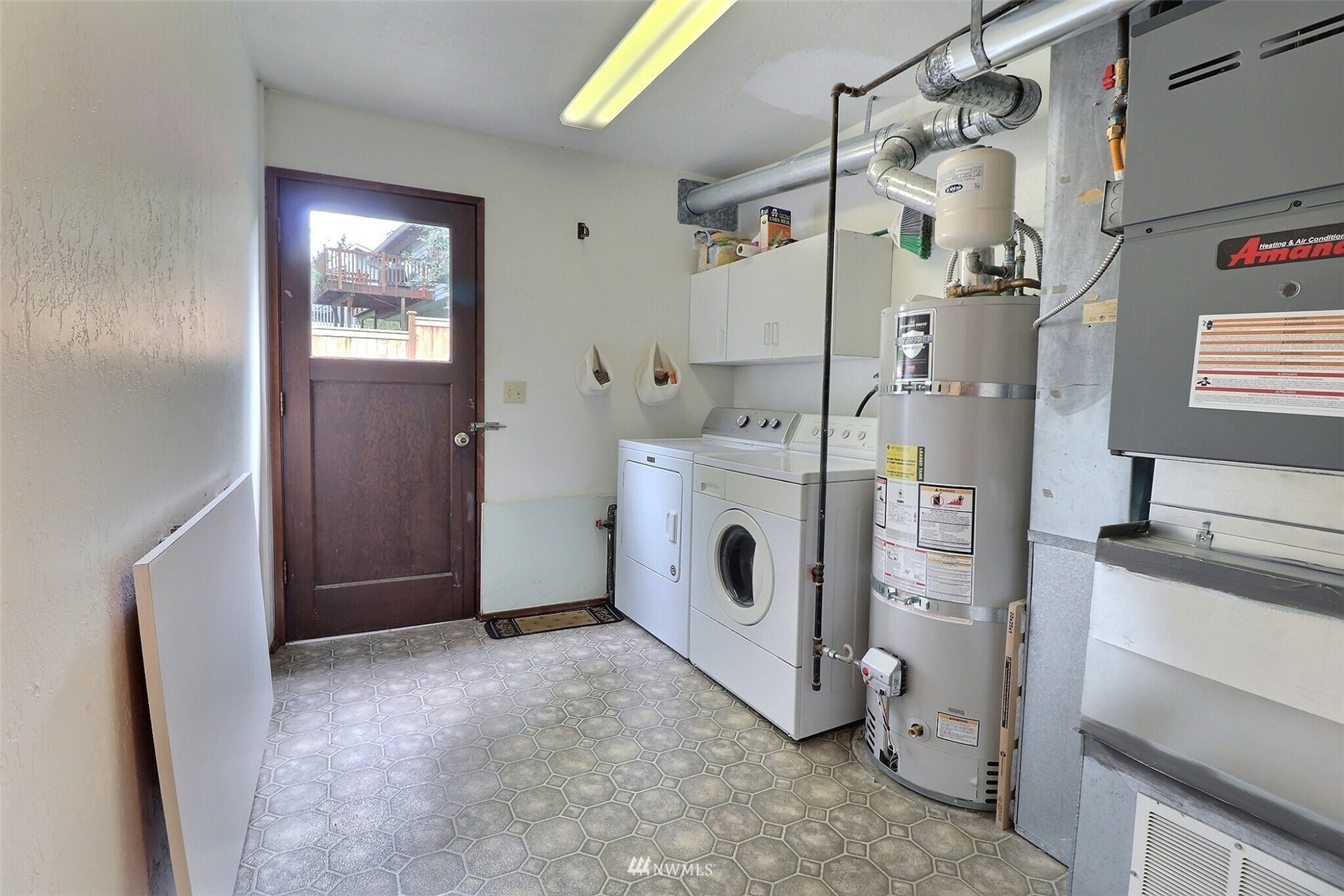 22105 2nd Place West Bothell, WA 98021 - Photo 28 of 37 a view of a storage & utility room with washer and dryer