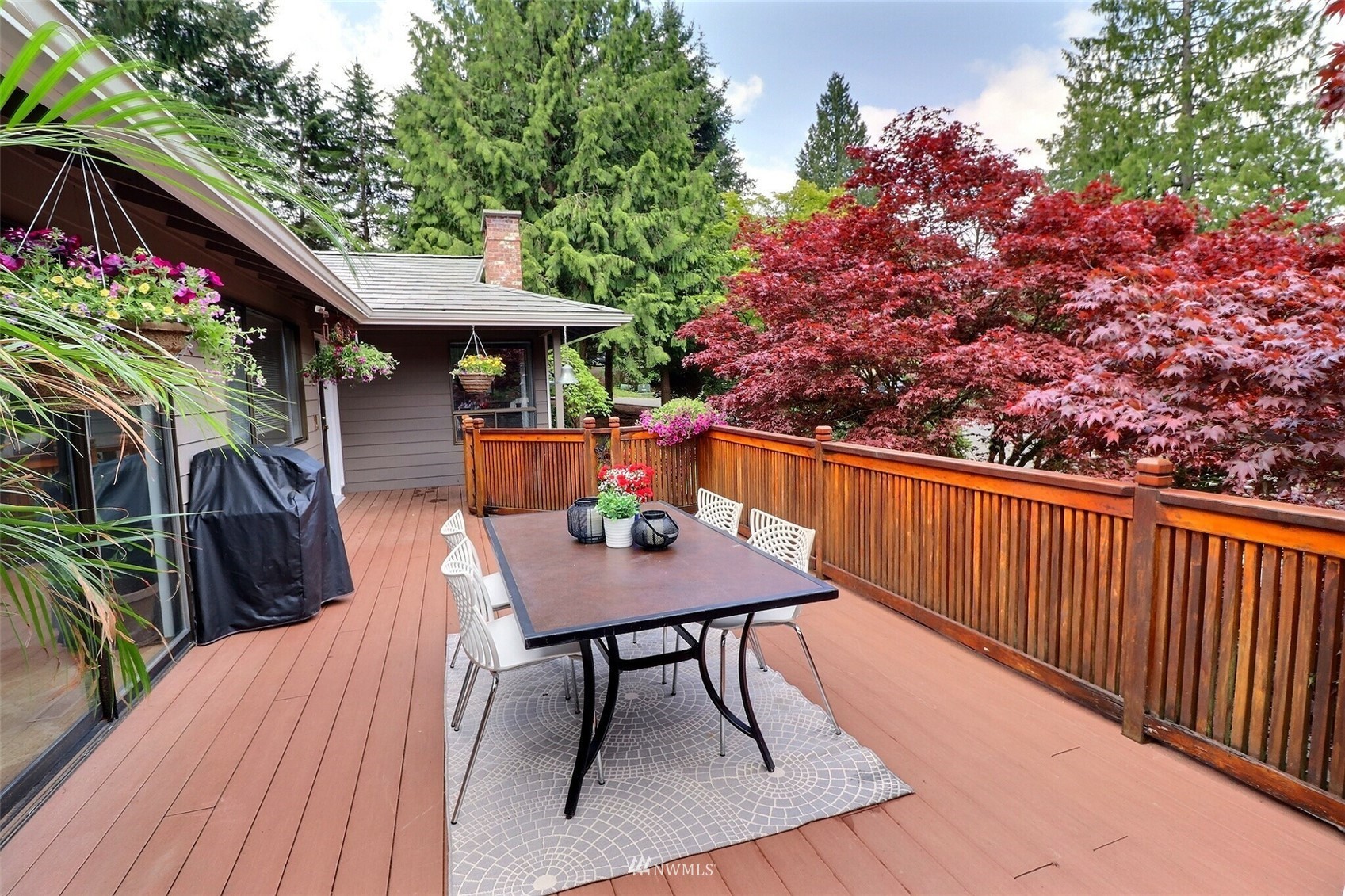22105 2nd Place West Bothell, WA 98021 - Photo 7 of 37 a backyard of a house with wooden floor barbeque oven and outdoor seating