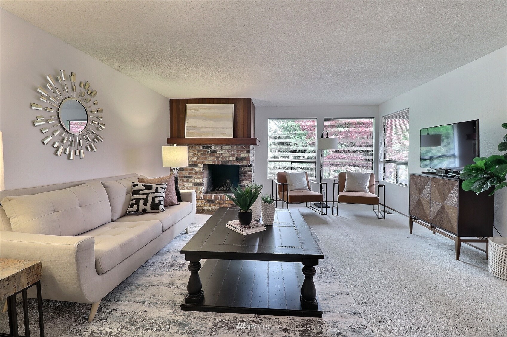 22105 2nd Place West Bothell, WA 98021 - Photo 10 of 37 a living room with furniture and a fireplace
