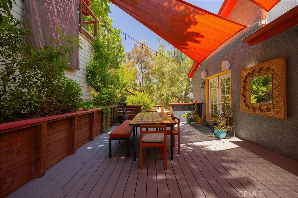 5341 Monterey Road Los Angeles, CA 90042 - Photo 30 of 40 backyard first level access from primary suite, guest bedroom 3 and property side stairs