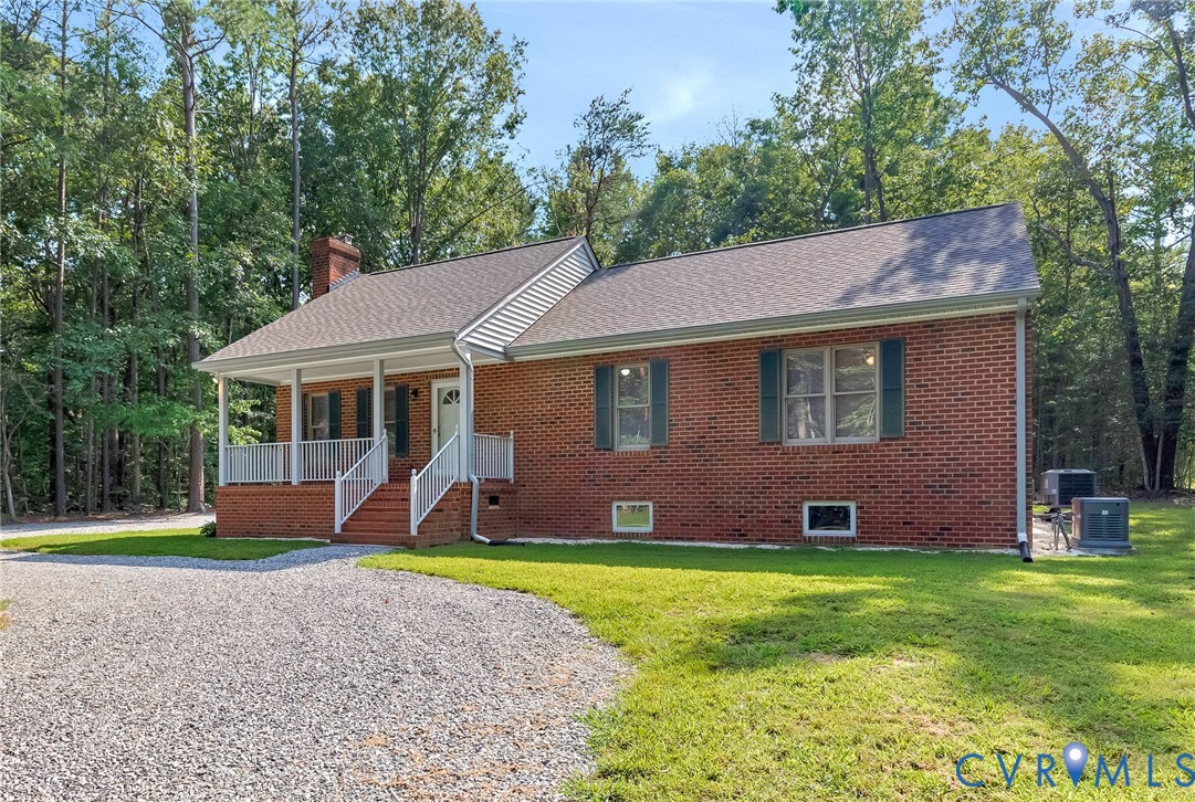 15321 Goshen Road Montpelier, VA 23192 - Photo 2 of 36 Charming brick ranch featuring a covered front por