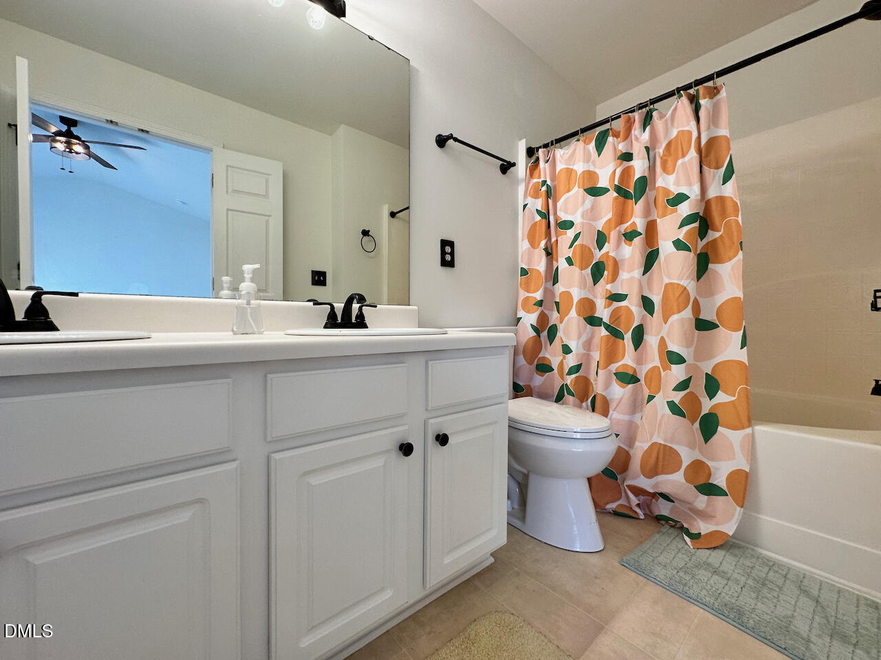 5105 Obion Court Raleigh, NC 27616 - Photo 14 of 22 a bathroom with a sink toilet and shower