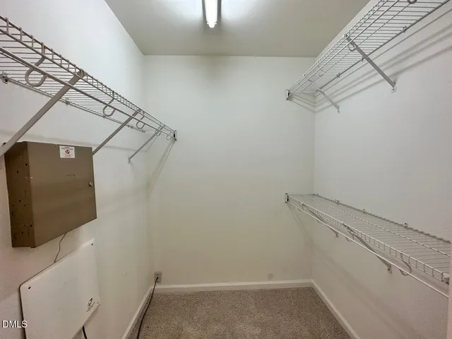 a view of a room with racks on the wall