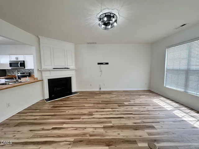 a view of kitchen and microwave