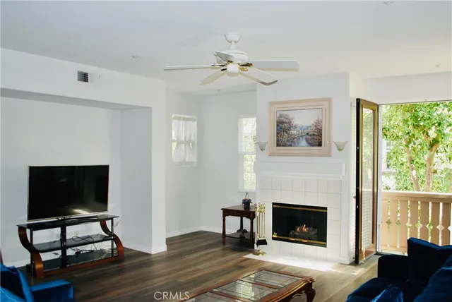 a view of a dining room with furniture wooden floor and chandelier