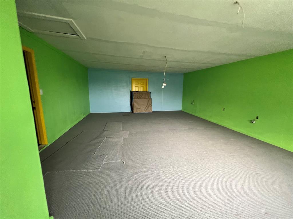 5811 Horizon Road Rockwall, TX 75032 - Photo 21 of 30 a view of a room with a projector and a window