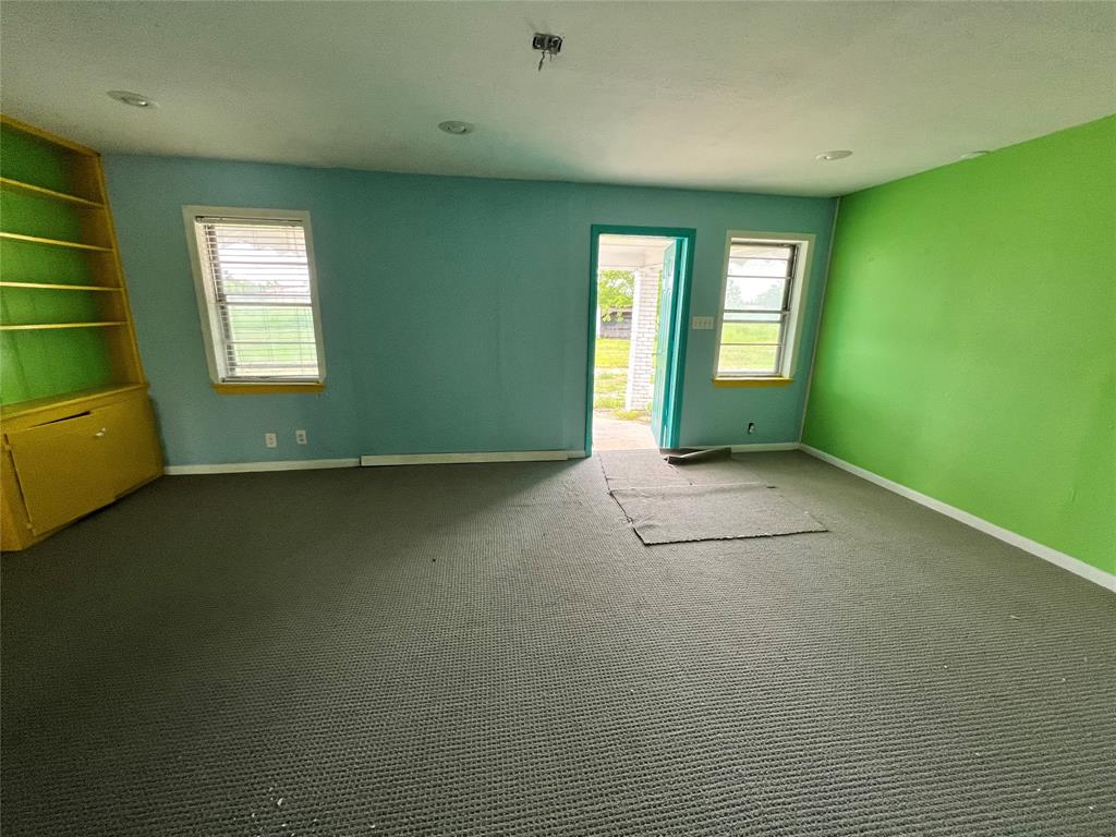 5811 Horizon Road Rockwall, TX 75032 - Photo 22 of 30 an empty room with windows