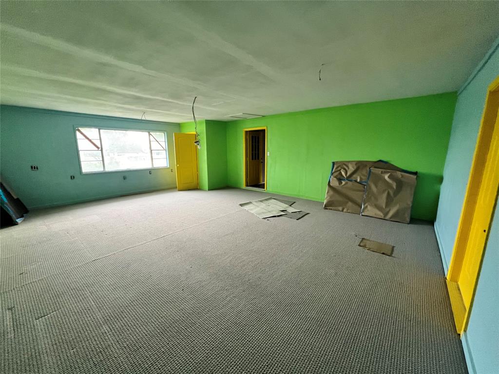 5811 Horizon Road Rockwall, TX 75032 - Photo 27 of 30 a view of an empty room with window and stairs