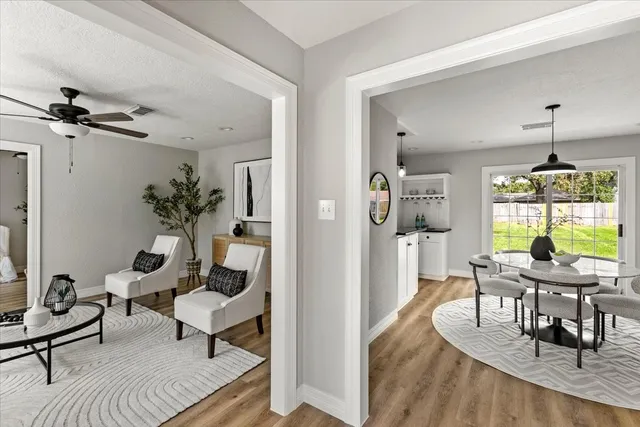 a living room with furniture and a window