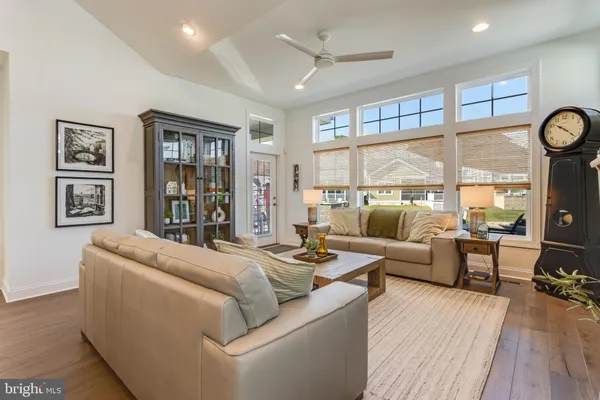a room with furniture and a flat screen tv