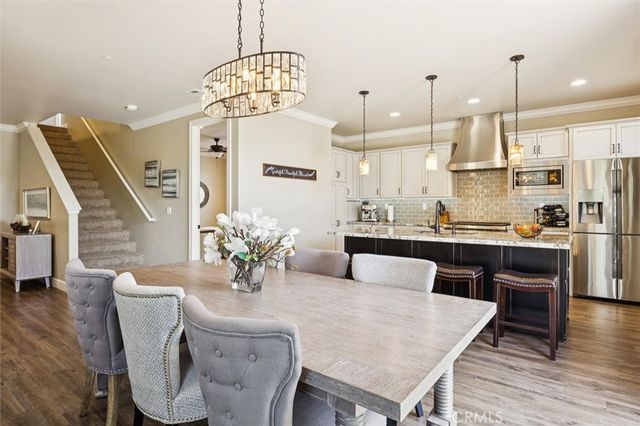 a bedroom with a bed and a table