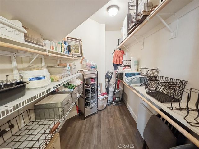a bathroom with double vanity sinks a vanity and a mirror