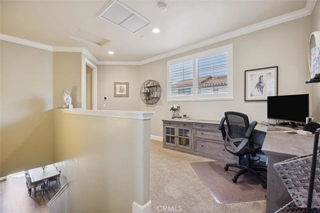 a spacious bedroom with a bed and window