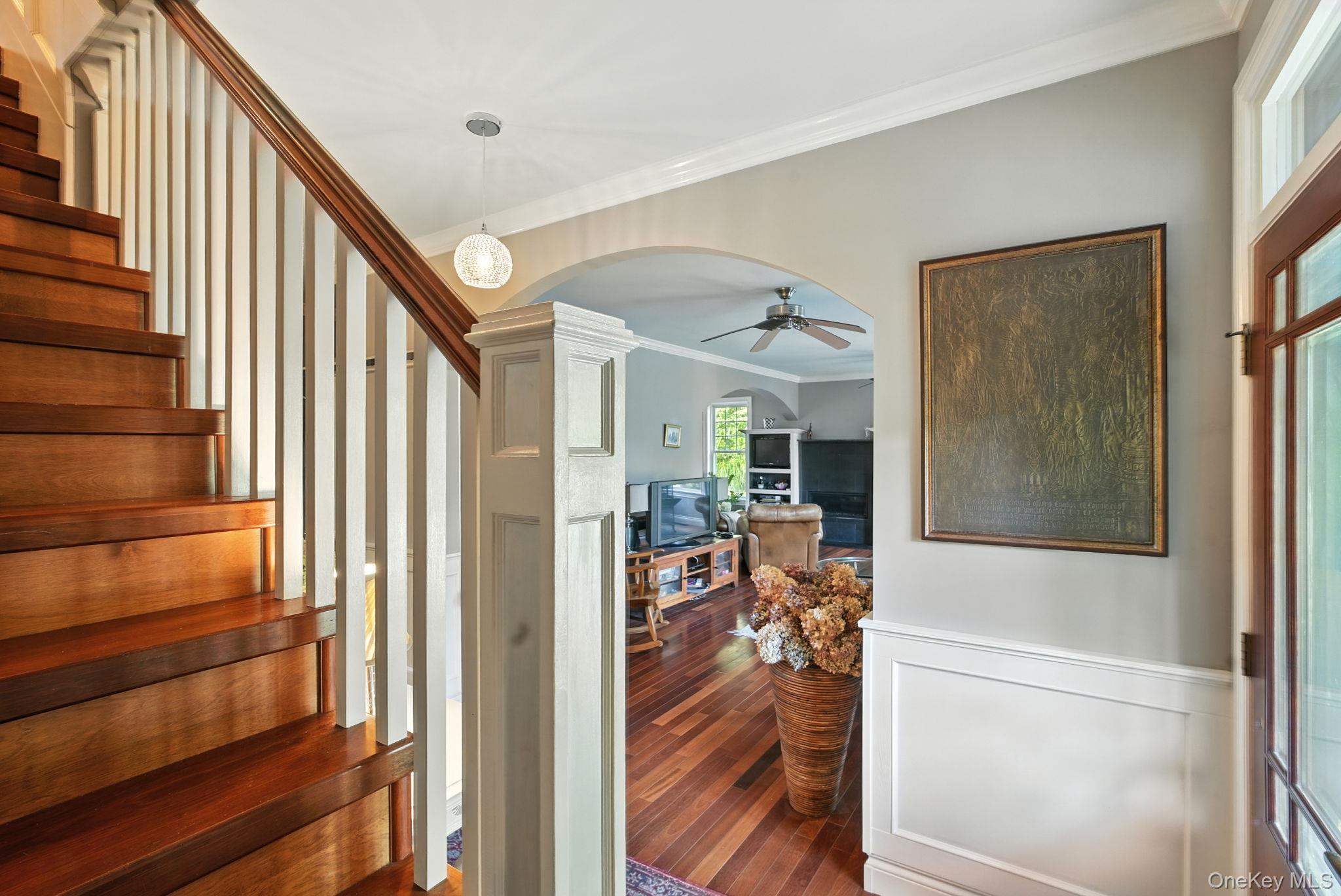 57 South White Rock Road Holmes, NY 12531 - Photo 14 of 44 a view of a hallway with wooden floor and staircase