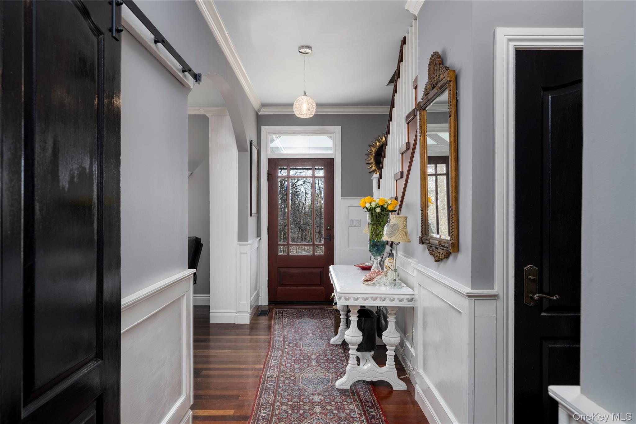 57 South White Rock Road Holmes, NY 12531 - Photo 16 of 44 a very nice looking room with a wooden floor and a mirror