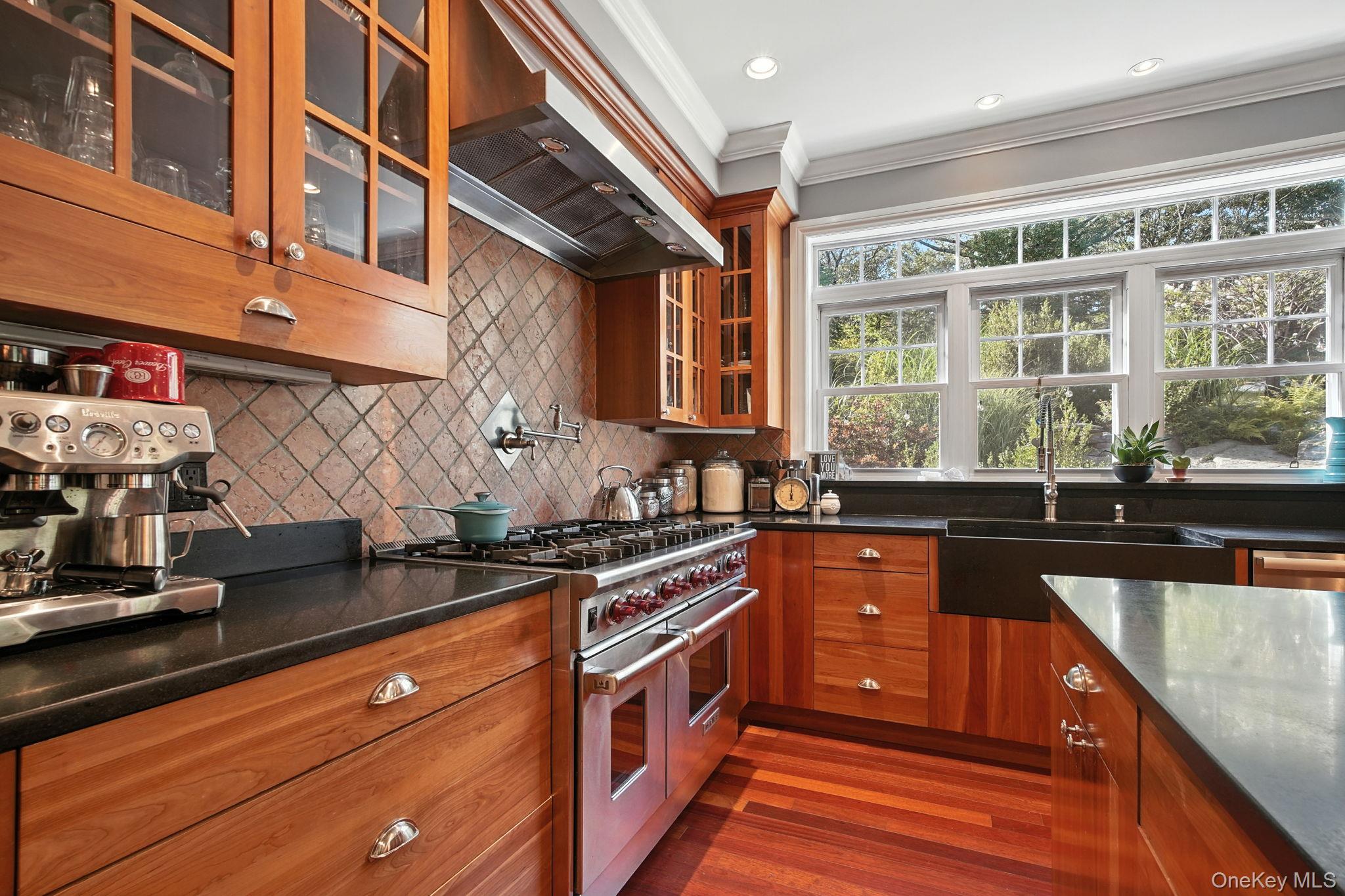 57 South White Rock Road Holmes, NY 12531 - Photo 19 of 44 a kitchen with stainless steel appliances granite countertop a stove and a sink