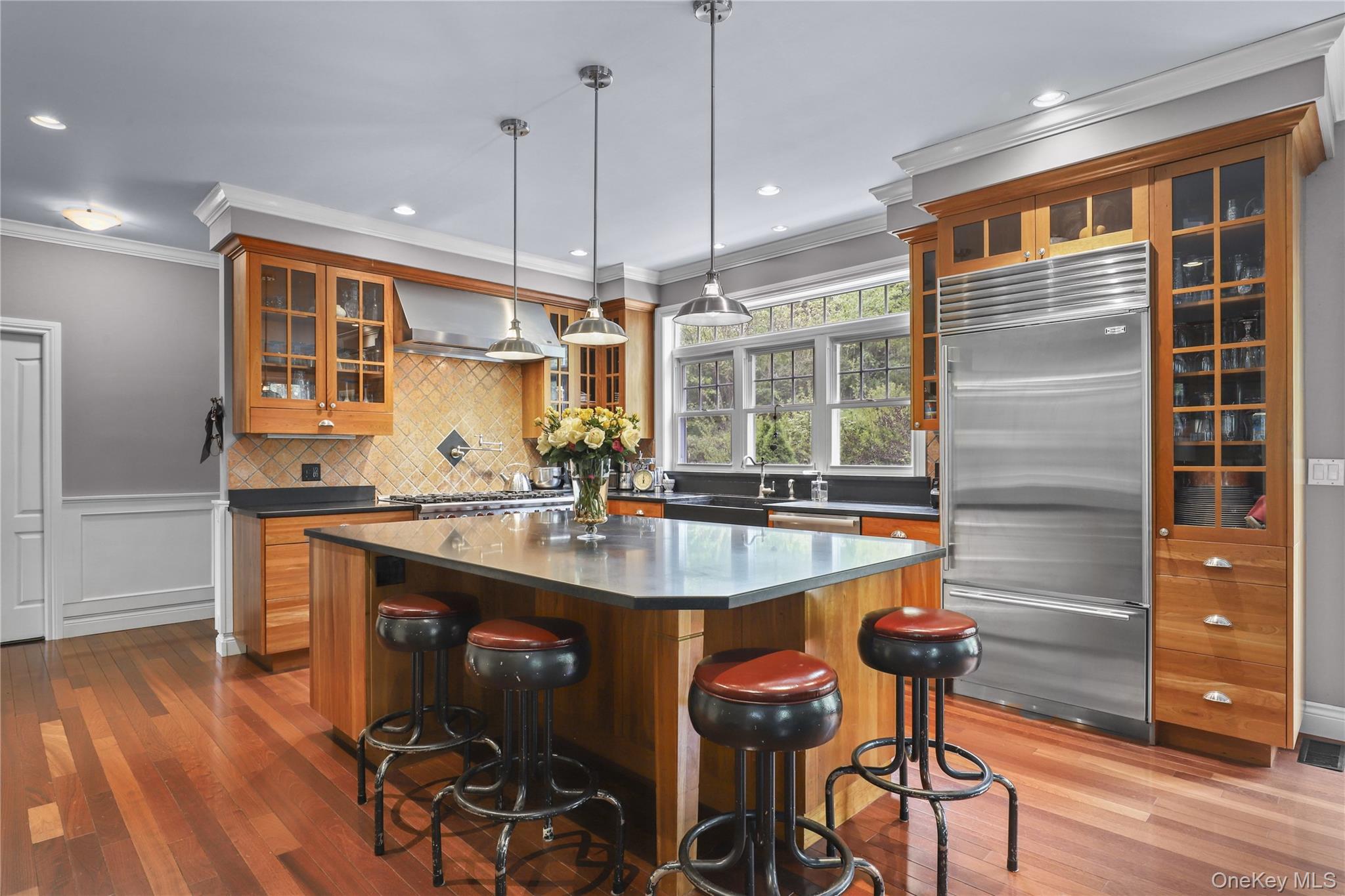 57 South White Rock Road Holmes, NY 12531 - Photo 2 of 44 a kitchen with a table chairs and wooden floor