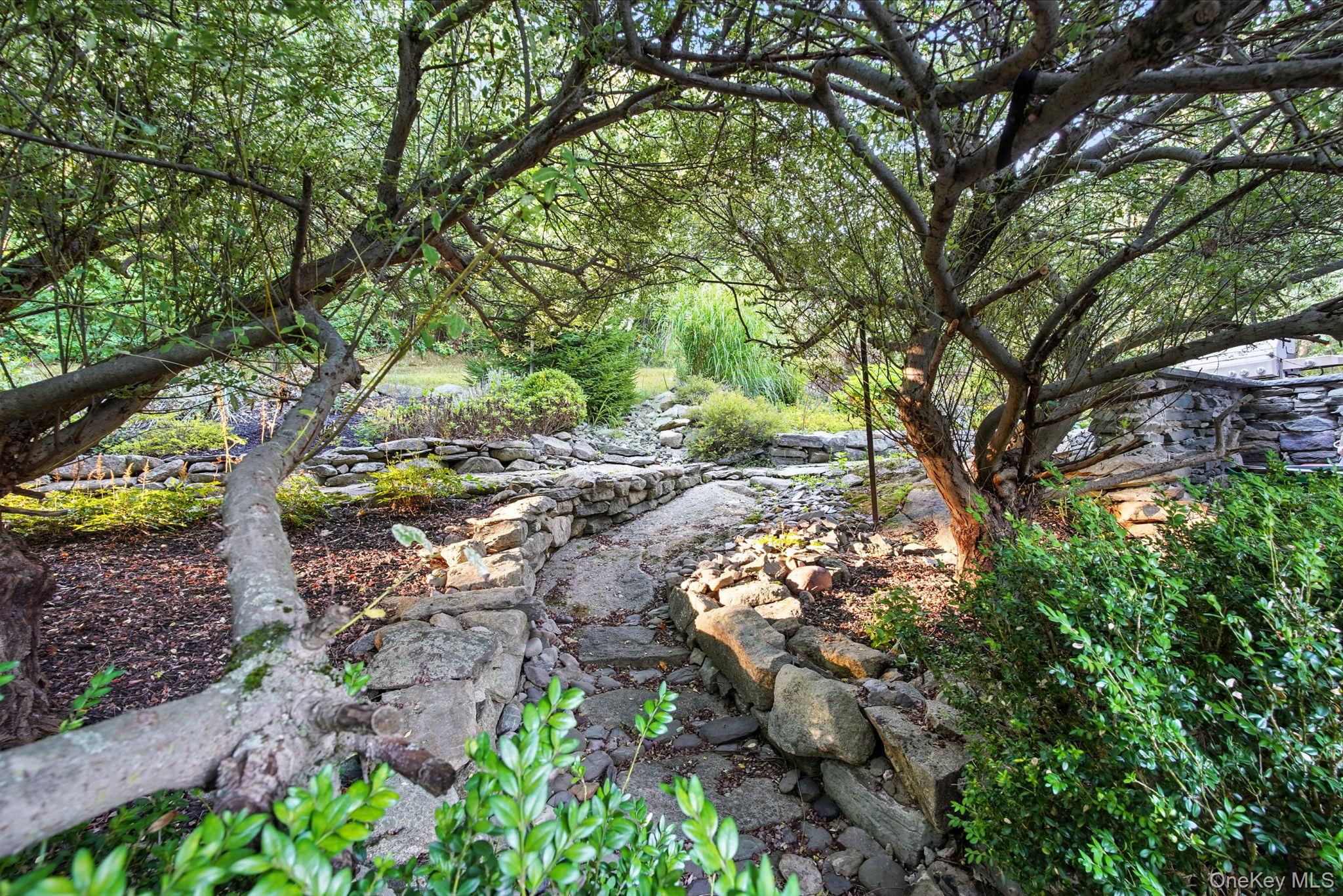 57 South White Rock Road Holmes, NY 12531 - Photo 32 of 44 a backyard of a house with a yard and outdoor seating