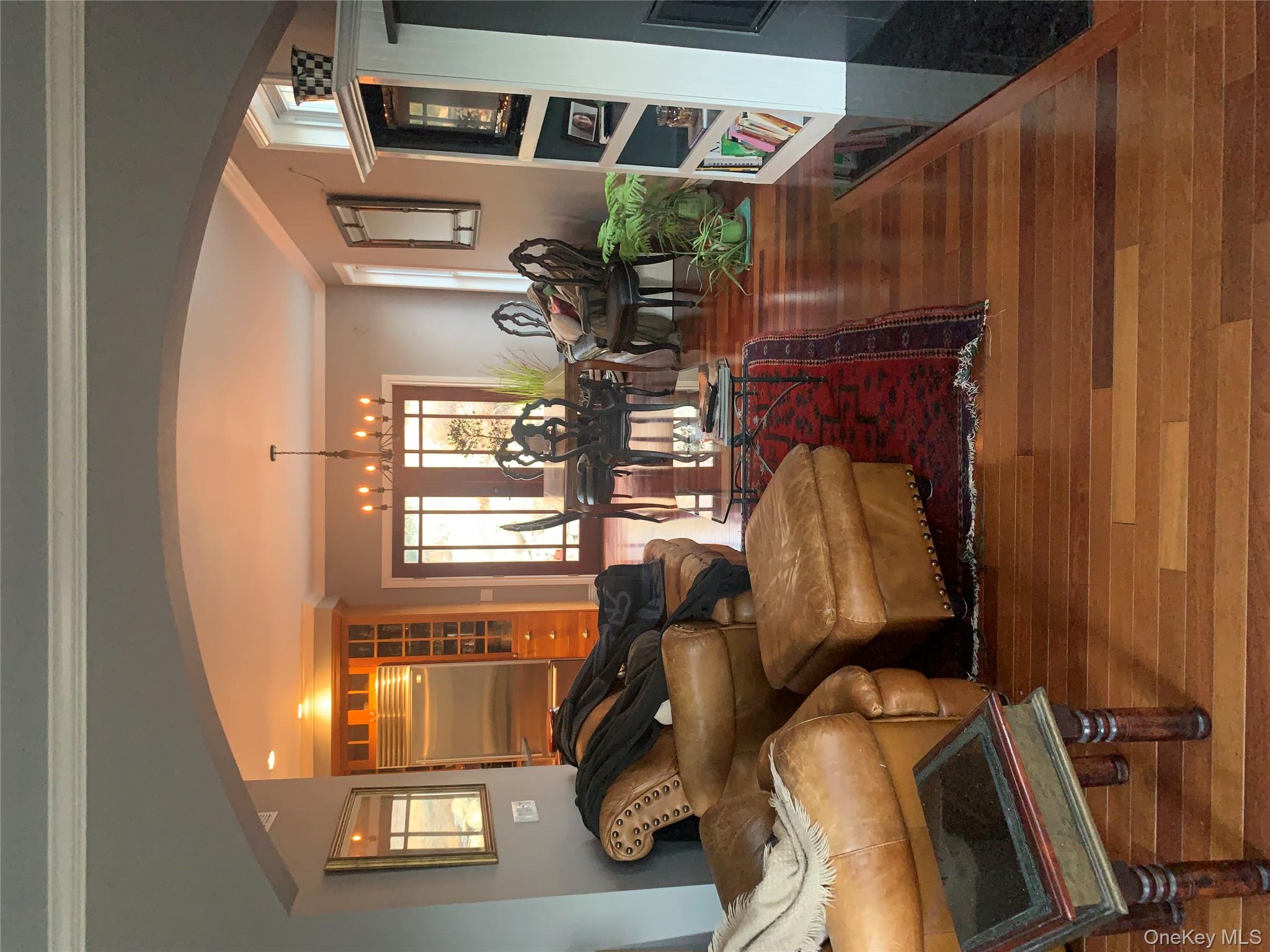 57 South White Rock Road Holmes, NY 12531 - Photo 42 of 44 a living room with furniture and a floor to ceiling window