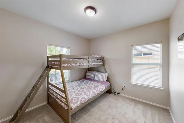 a room with a couch and window