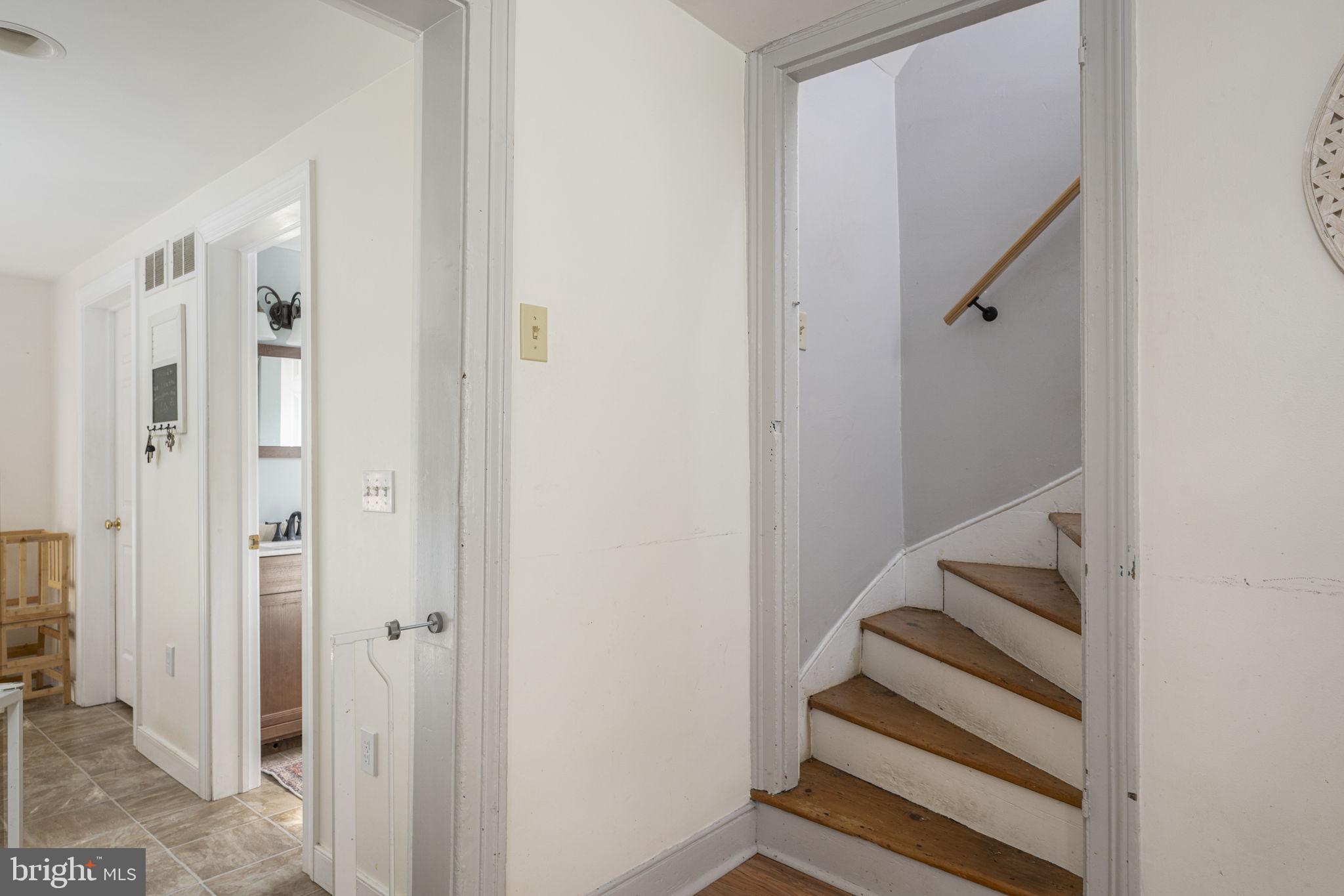 650 Fairview Road Glenmoore, PA 19343 - Photo 12 of 29 a view of entryway with stairs and wooden floor